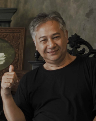 Dr. Akhmad Nizam, M.sn.